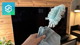 cleaning materials in front of smart tv